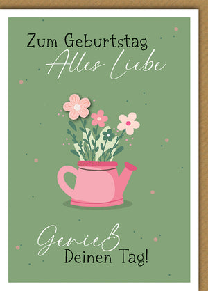 Geburtstagskarte Elegant: Rosa Gießkanne mit Blumenstrauß auf grünem Hintergrund